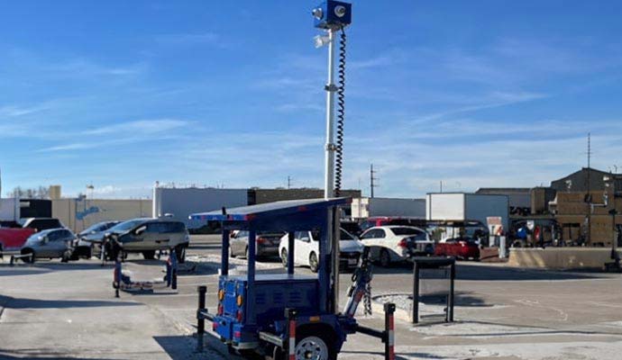 A mobile security camera unit in parking lot