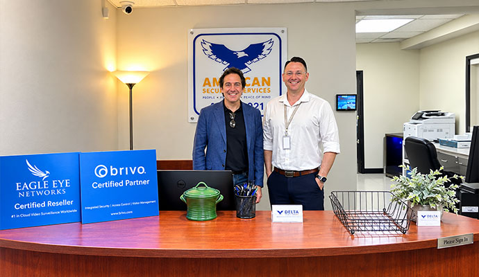 American Security Devices team members at office reception desk