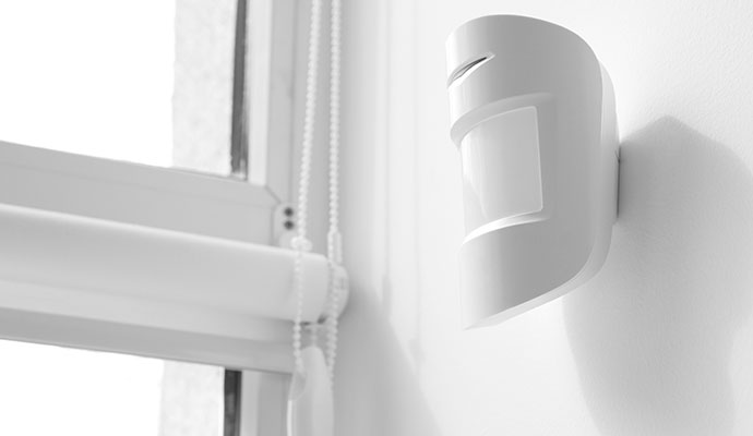 Motion sensor placement near a window