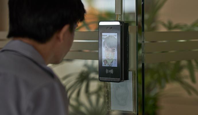 Person using video verification system for security access