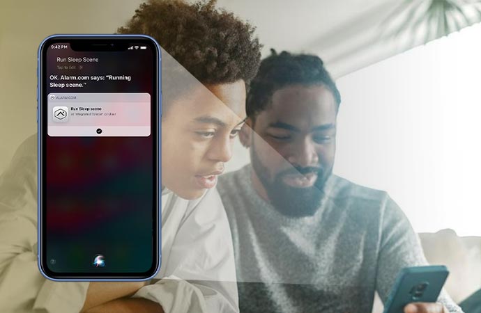 A couple happily exploring new features on a smartphone screen together.