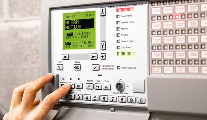 Digital display showing an active fire alarm