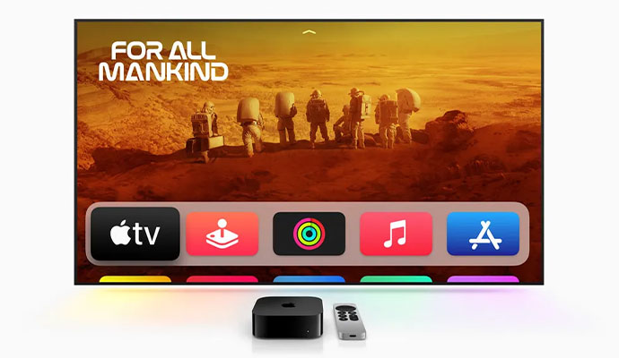 A large flat-screen television displaying the Apple TV 4K interface
