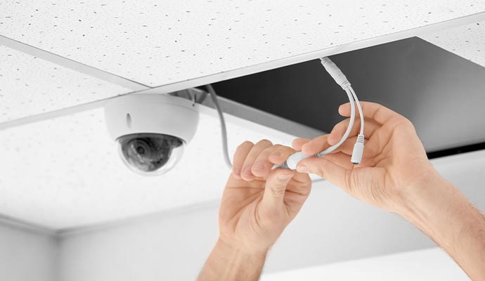 Person installing panoramic camera
