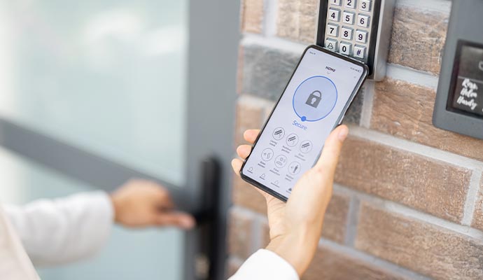 a person opening a password-protected door lock