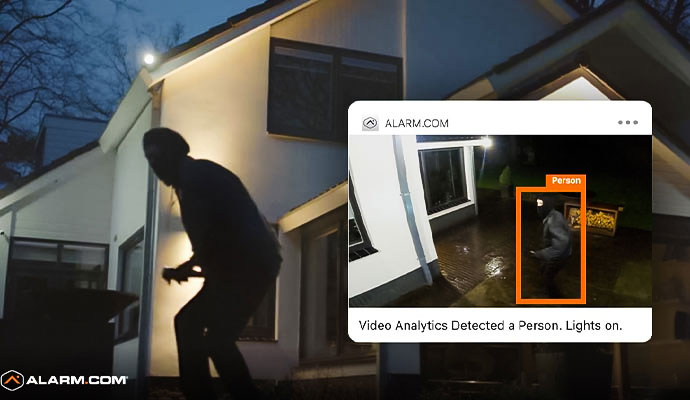 Outdoor security camera detecting intruder at night with video analytics