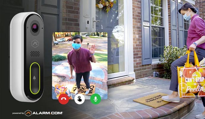 Person interacting with video doorbell