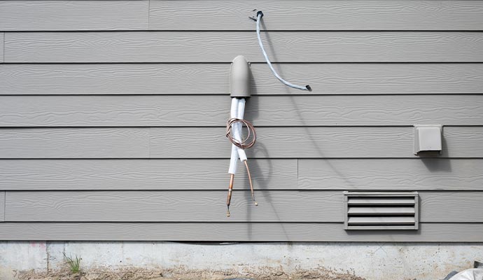 Wall mounted vent with cable and junction box