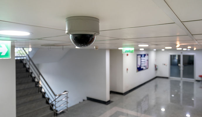 Indoor dome security camera installed in a commercial building