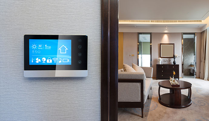 Interactive home security smart touchscreen panel on wall