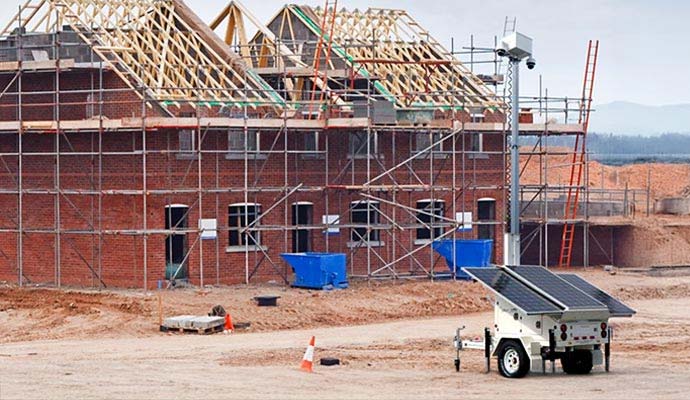 Mobile solar security trailer deployed at construction work site