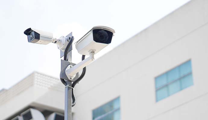 Outdoor bullet security cameras mounted on a pole