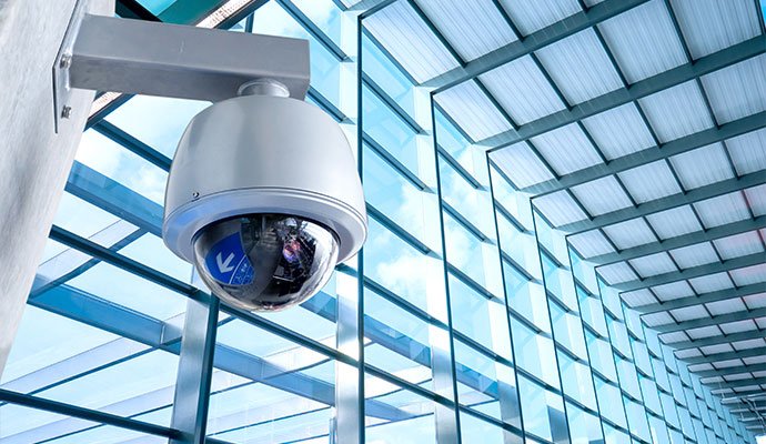 Commercial security camera installed in a modern building