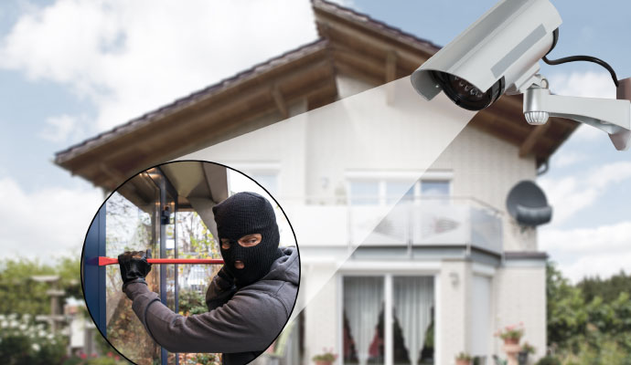 Security camera monitoring an attempted home intrusion outside a residential property