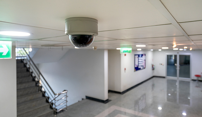 Indoor CCTV surveillance in building hallway