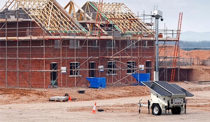 Mobile solar security trailer at construction site