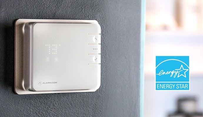 A smart thermostat on wall