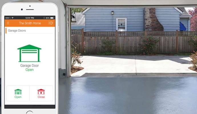 Smartphone app showing garage door status and remote control in smart home system