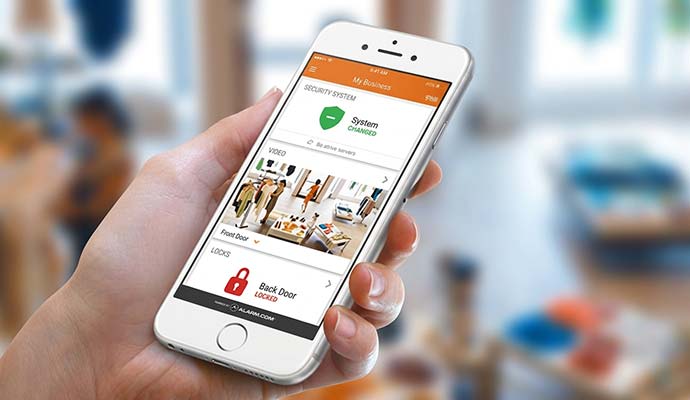 Smartphone displaying business security monitoring and video feed