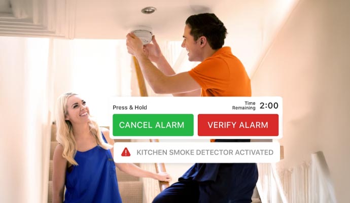 Person installing a smoke detector