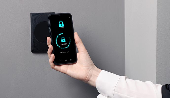 Person using smartphone with touchless door access system